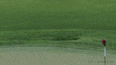 Jason Dufner with a rare show of emotion, firing his club into the water.
