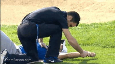 Sergio getting some work done on his shoulder after tweaking it in the thick rough.