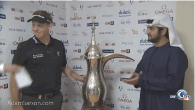 Stephen Gallacher kisses the trophy after winning the 2014 Omega Dubai Desert Classic.