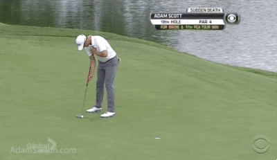 Scott hits the final putt.