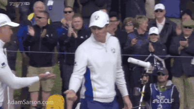 Another golfer high five fail.