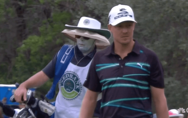 Jonas Blixt's caddie is taking no chances in the sun.