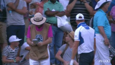 Henrik Stenson is not happy with the rake of the bunker.