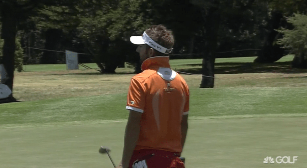 Jbe Kruger getting aggressive with the collar, orange shirt, red pants combo.