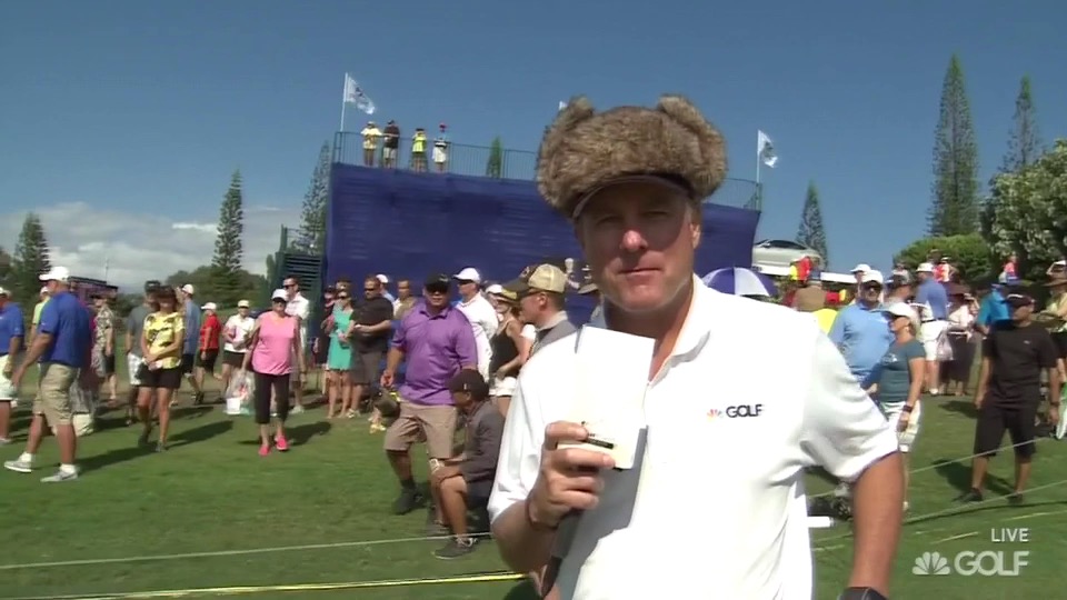 Jerry Foltz wearing the hat of a fan.