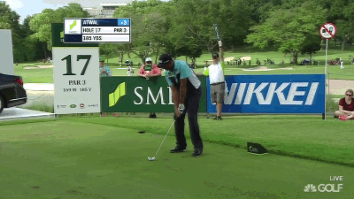 Arjun Atwal lets go, but it's not bad.