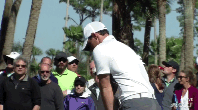 Rory with a practice swing twirl.