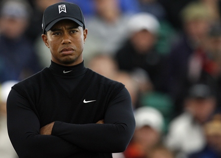 US golfer Tiger Woods stands on the 14th green, on the second day of the 138th British Open Championship at Turnberry Golf Course in south west Scotland, on July 17, 2009. AFP PHOTO/Glyn Kirk (Photo credit should read GLYN KIRK/AFP/Getty Images)