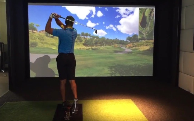 Tiger in the simulator. (Courtesy: Tiger Woods)